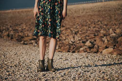evening dress woman standing on gravel wearing floral dress person